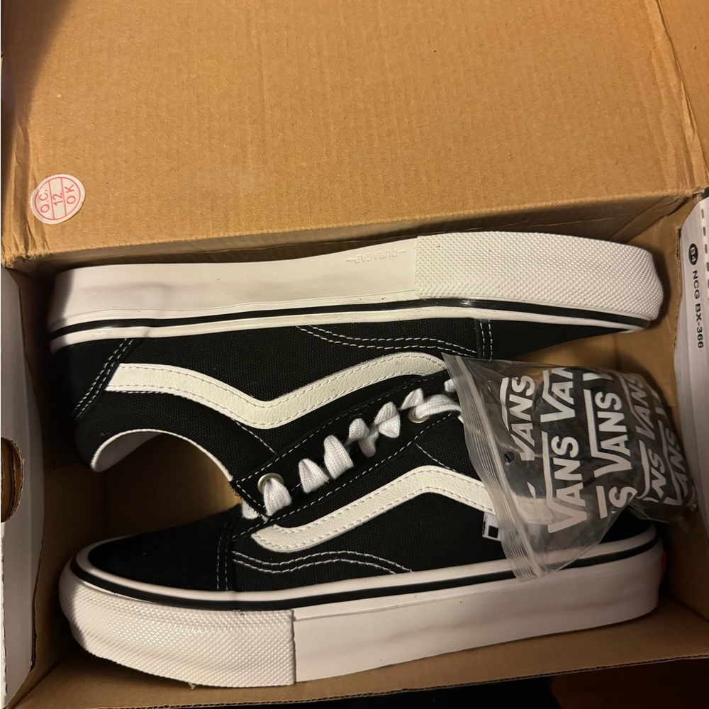 Vans Black and White Sneakers